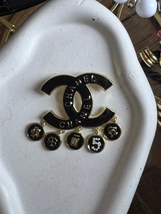 Broche inspiration breloques